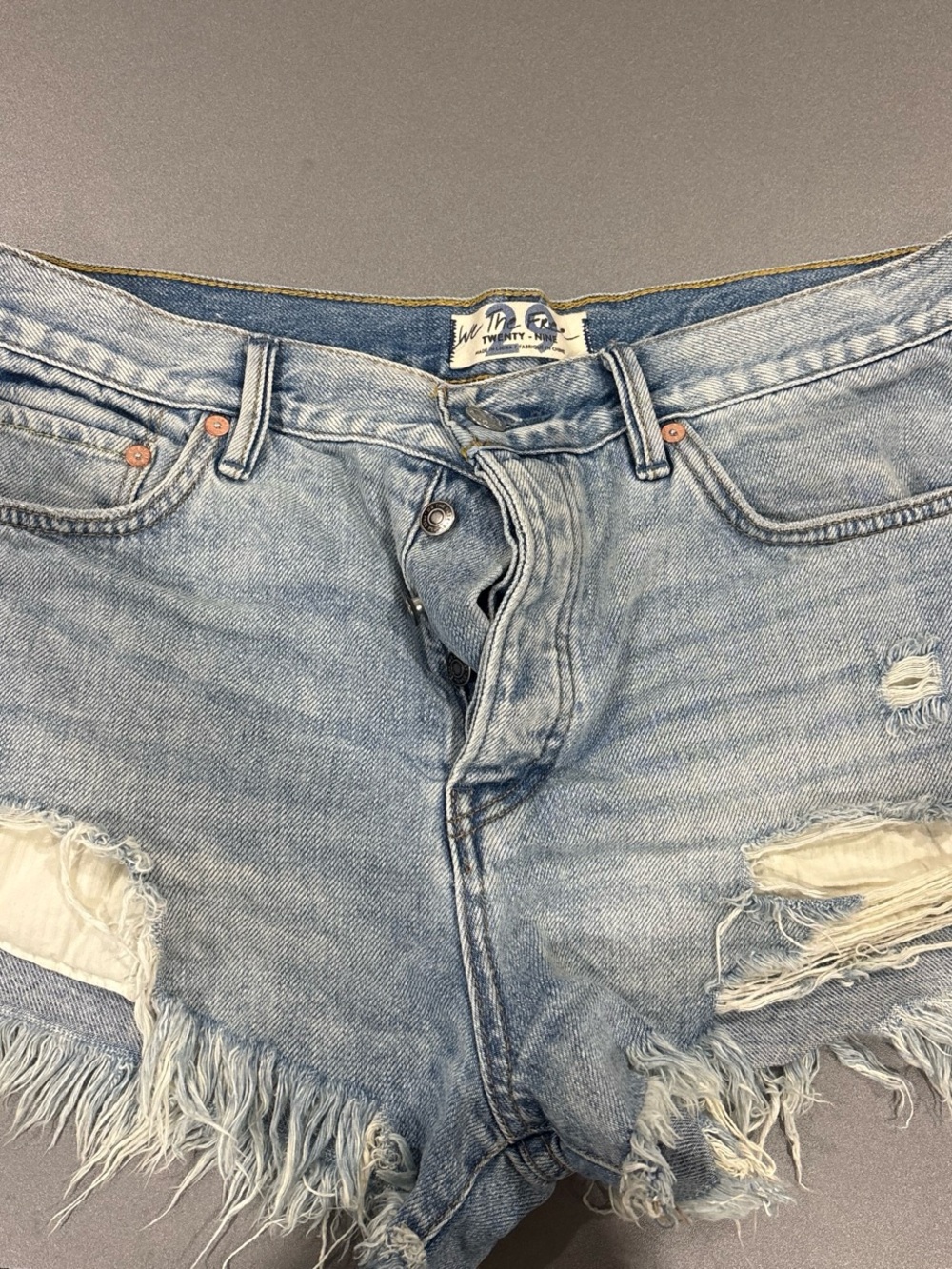 We The Free Light Wash Distressed Denim Cutoff Shorts